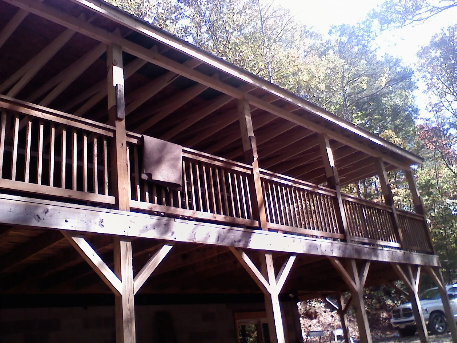 Timber framing under a new elevated porch and deck — Roof Leak Repair in Granite City by Roofing Brothers